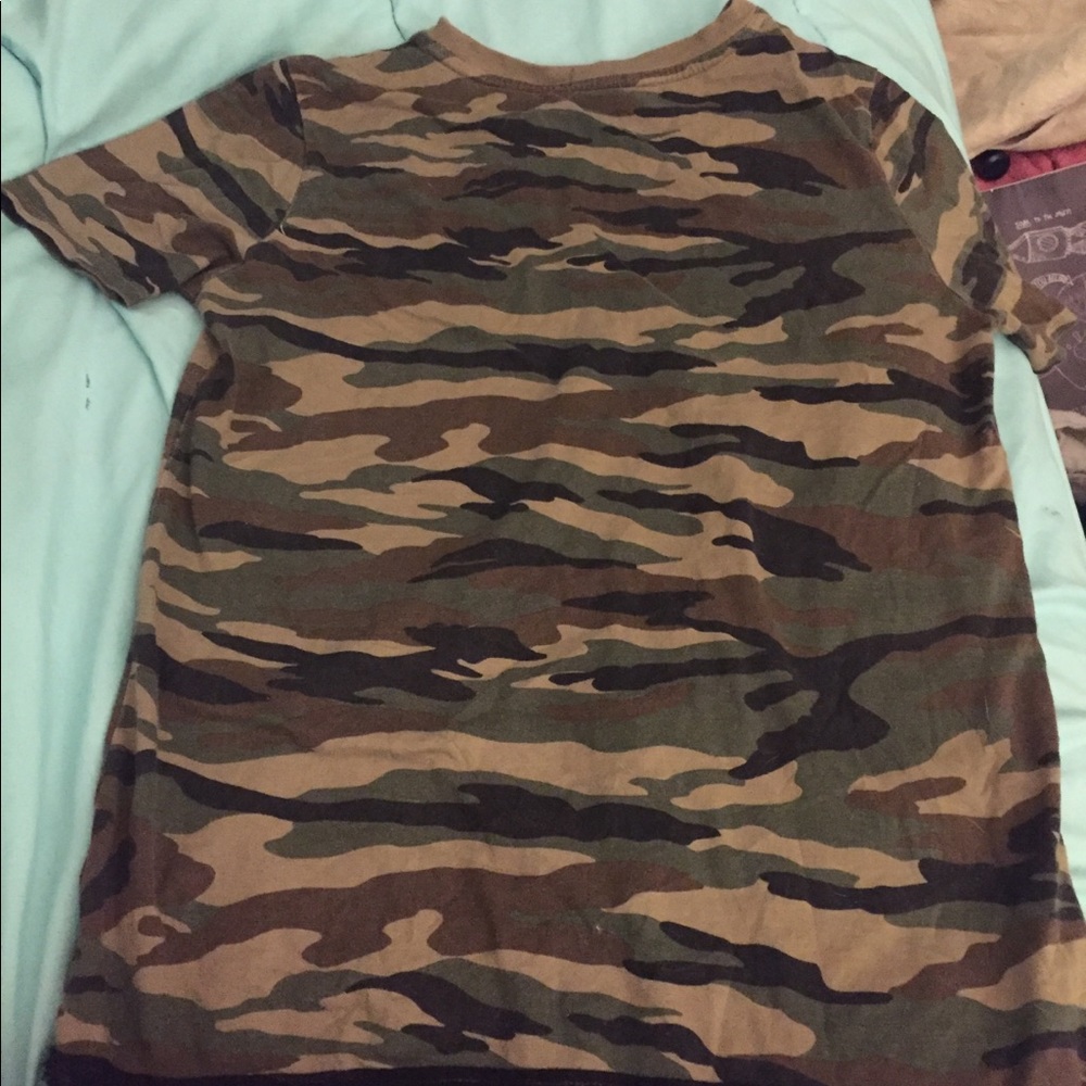A camouflage t shirt.